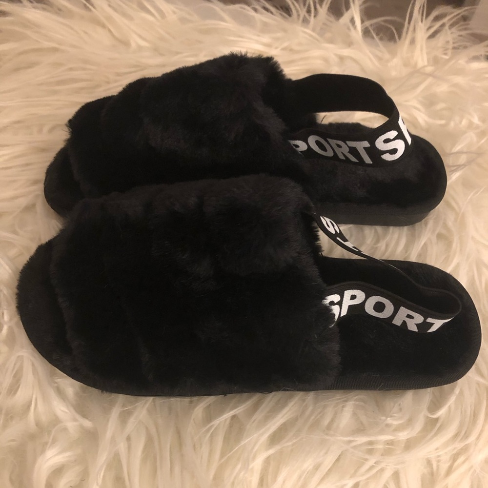 Plushy black slippers